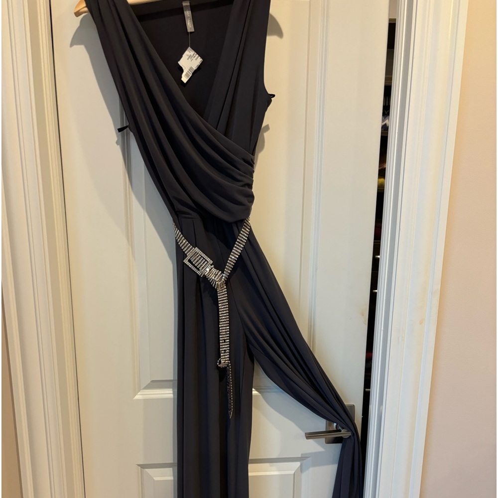 Beautiful jumpsuit with tag. Never be worn.made by last Tango.   Belt was extra!